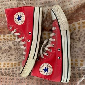 Red converse high tops